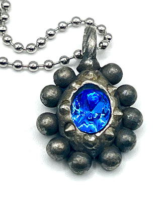 One-of-a-Kind Todd Oldham Studio Signed 1995 Silver-Plated Ebonized Rub Charm Necklace with Bright Blue Swarovski Crystal