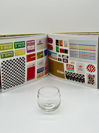 Signed Alexander Girard Monograph Paired With Rare Braniff Glass