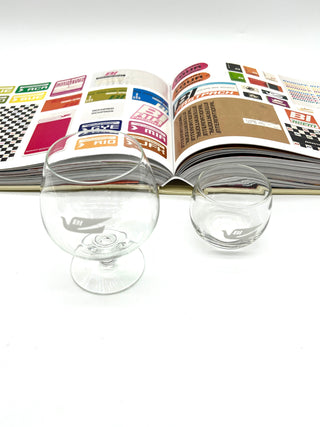Signed Alexander Girard Monograph Paired With Two Rare Braniff Glass